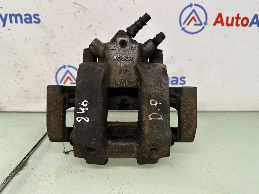Front brake caliper 6857688