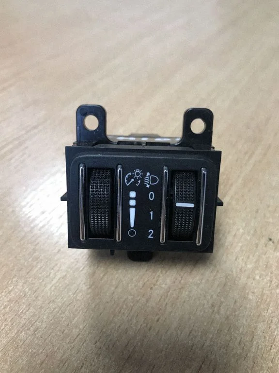 Headlight level height control switch – Maserati Ghibli (2013-)