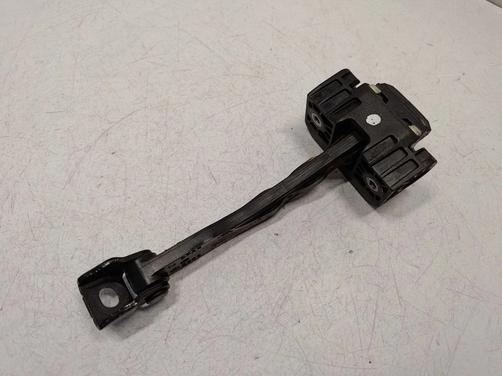 Front door check strap stopper 7182005