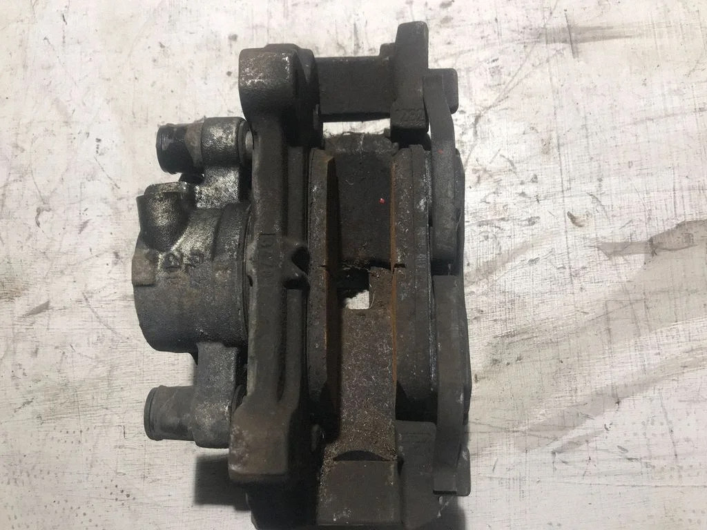 Front brake caliper 31381549