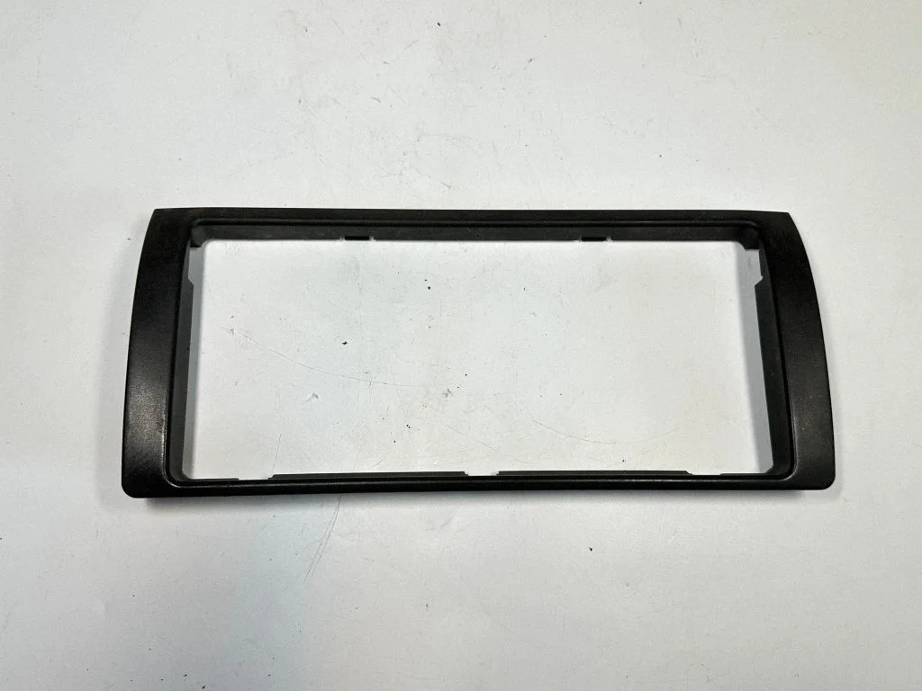 Radio/GPS head unit trim 6908469