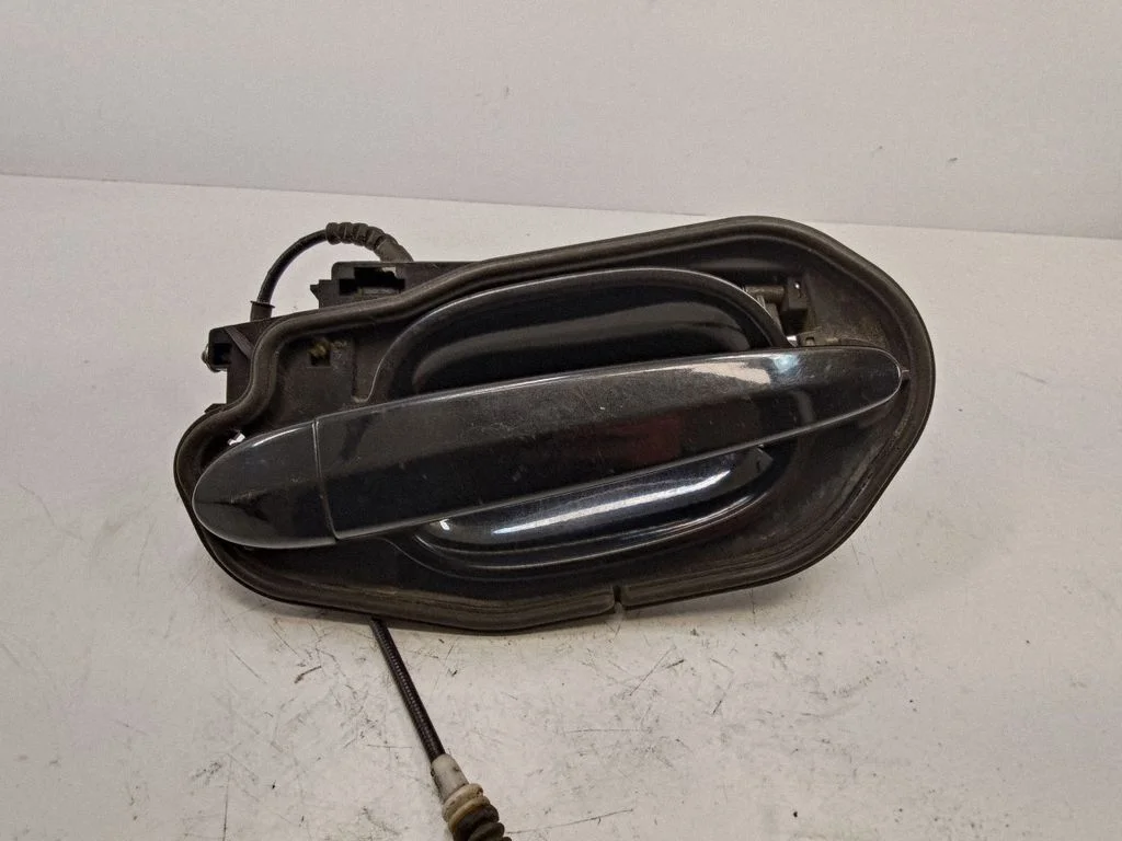 Rear door exterior handle 7034544
