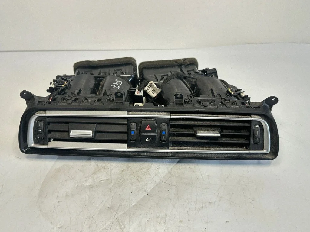 Dash center air vent grill 9115859
