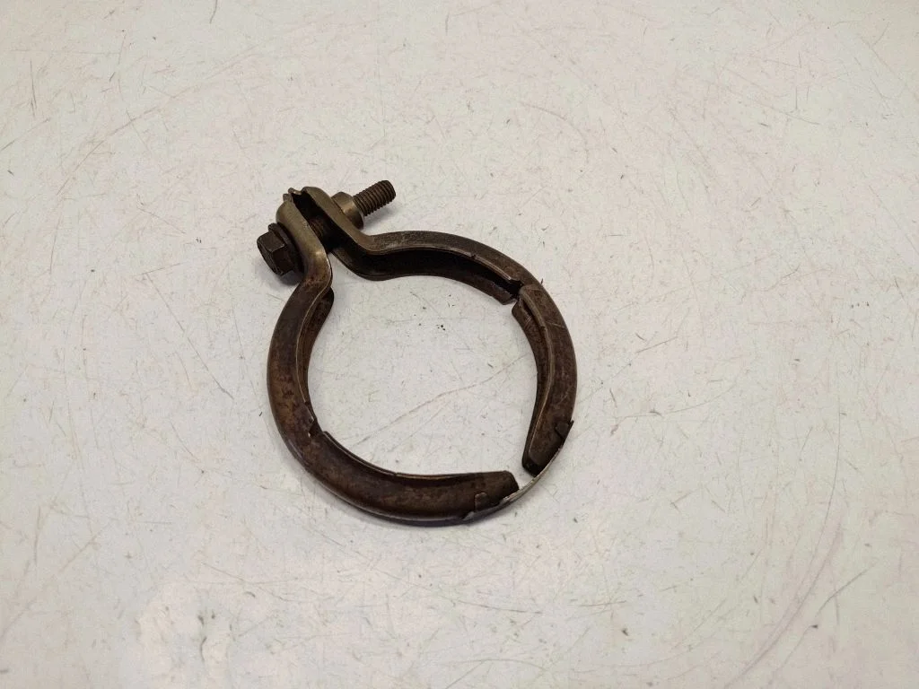 Muffler pipe connector clamp 7806991