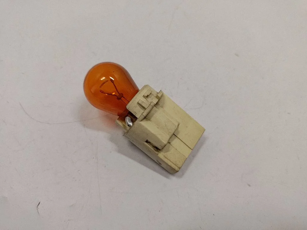 Tail light bulb cover holder 63216903651