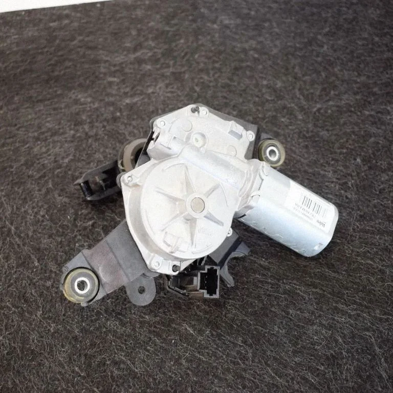Aizmugurējā stikla tīrītāja motoriņš 287104EL0A
