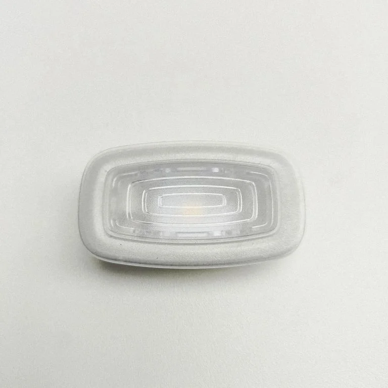 Lampka przednich siedzeń A0009065509