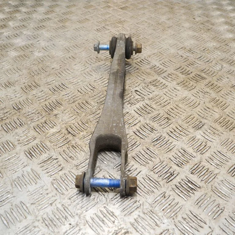 Rear upper control arm/wishbone – left