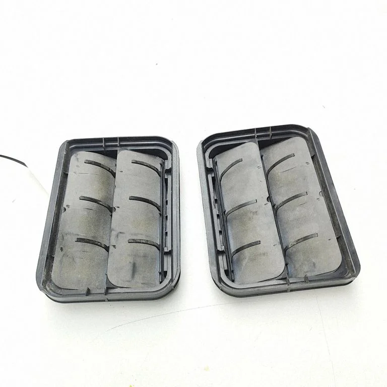 Quarter panel pressure vent 7700838358