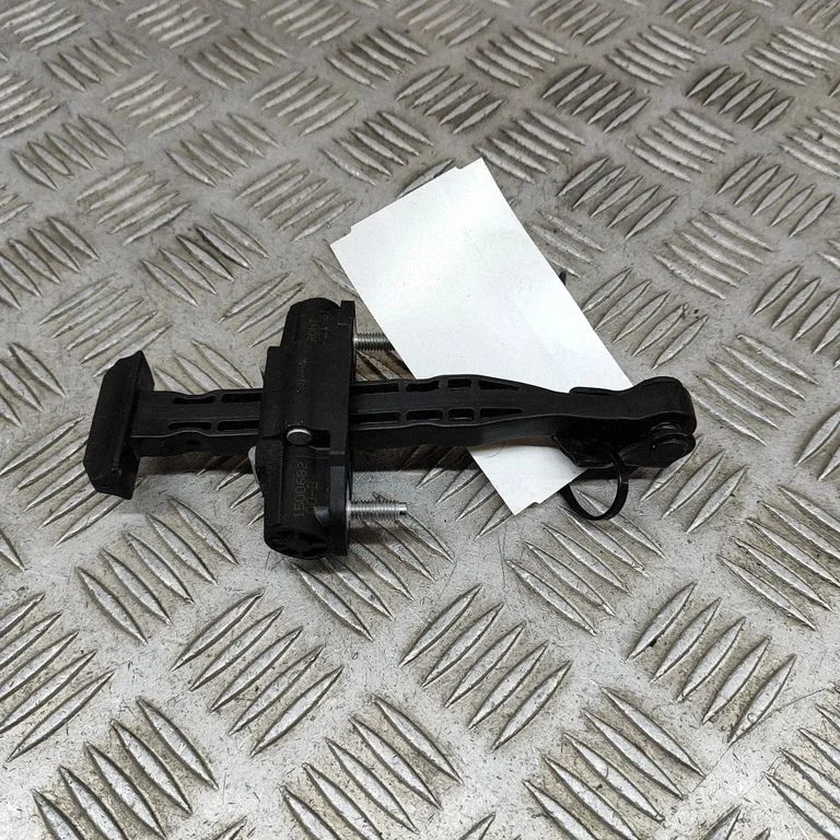 Front door check strap stopper – Tesla Model Y (2020-)