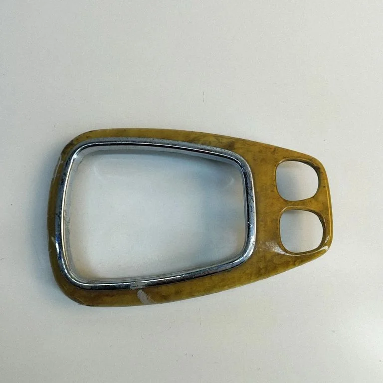 Pārnesumu pārslēga sviras apdare (plastmasas)