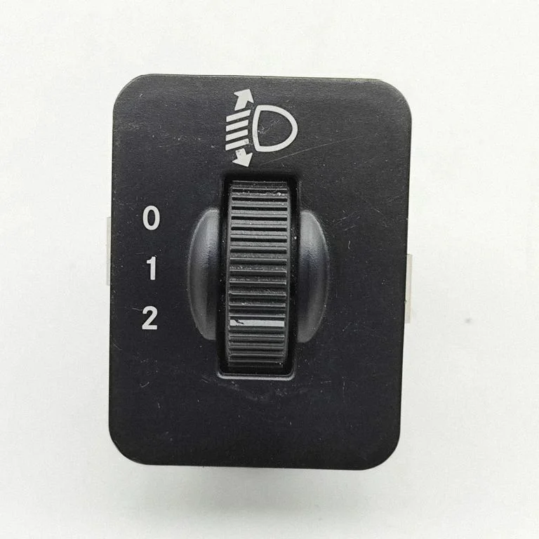 Headlight level height control switch – Chrysler Voyager (2008-2016)