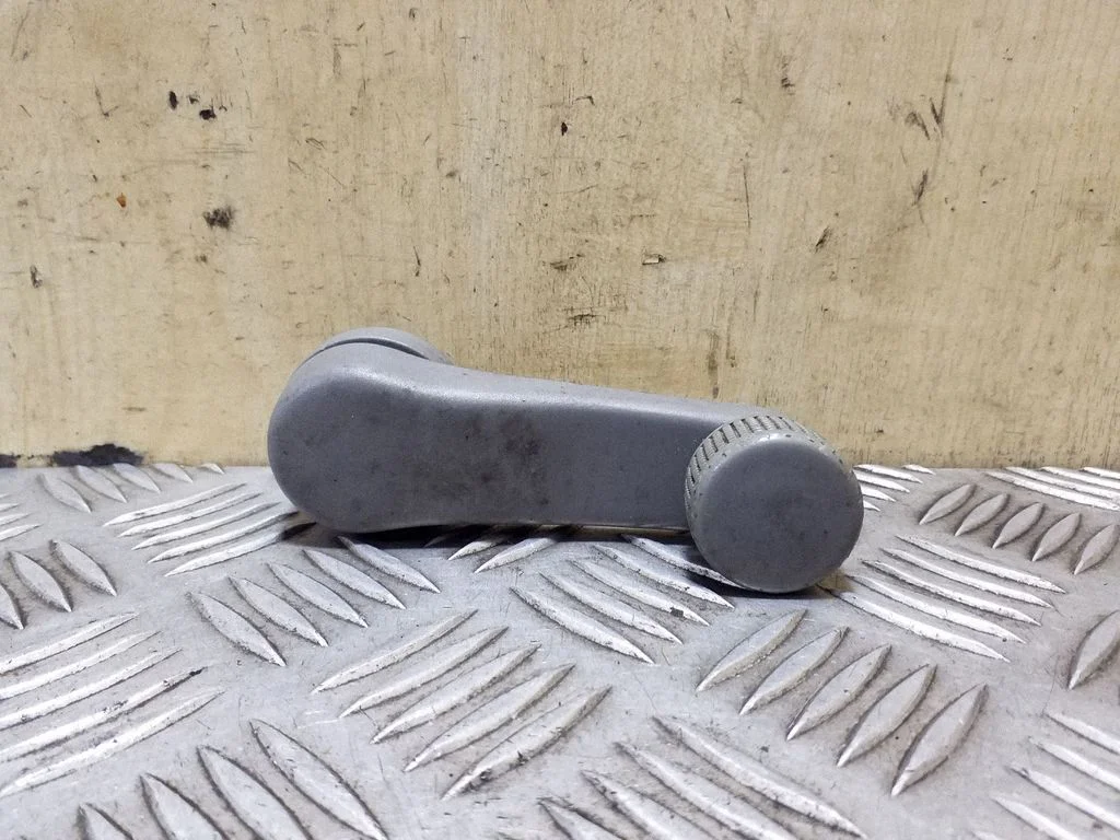 Front door window winding handle 1H0837581D