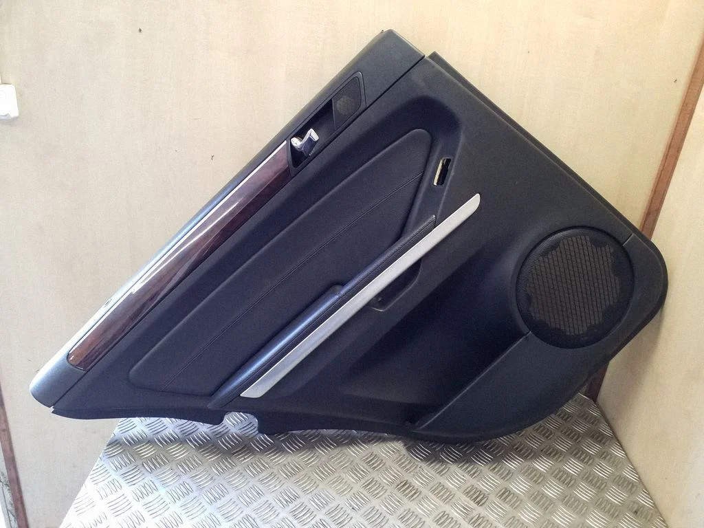 Rear door card panel trim – left