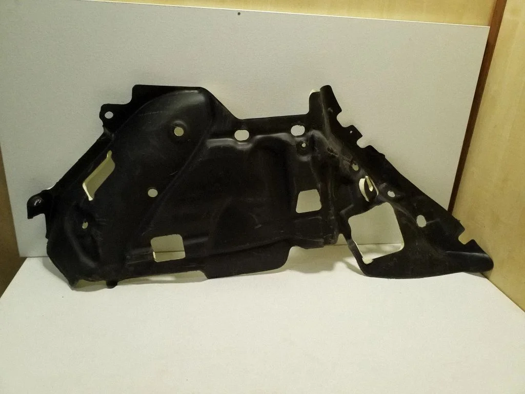 Kita bagažinės apdailos detalė