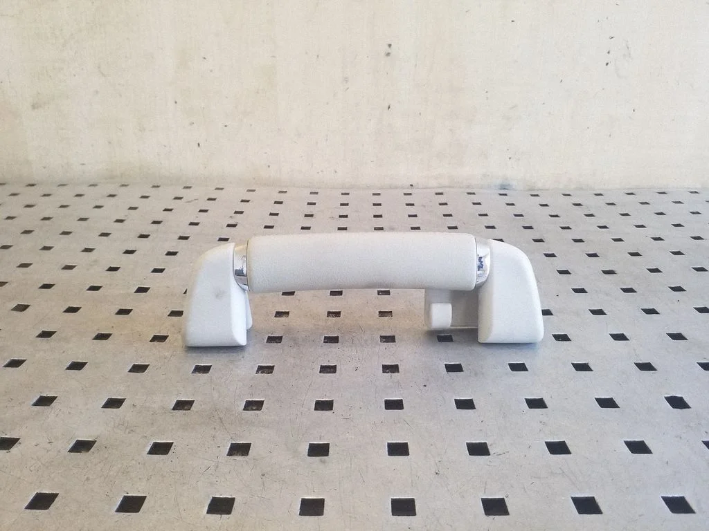 Rear interior roof grab handle – left