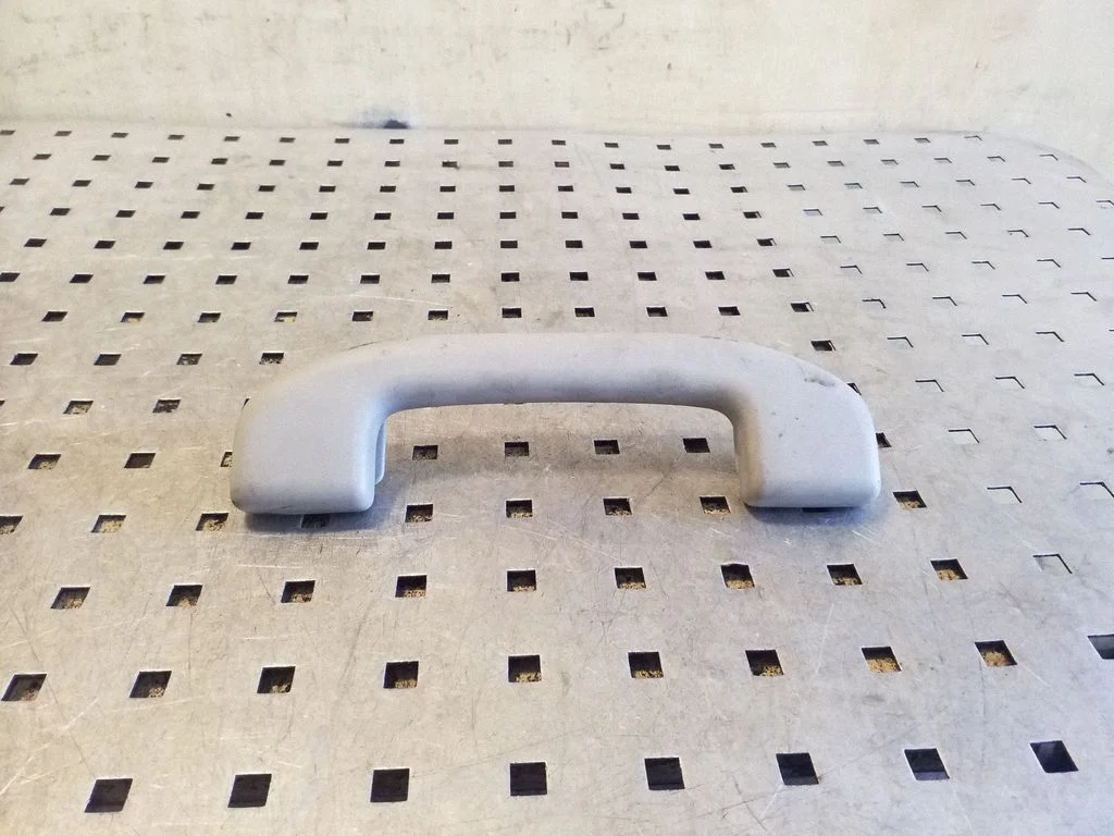 Rear interior roof grab handle – left