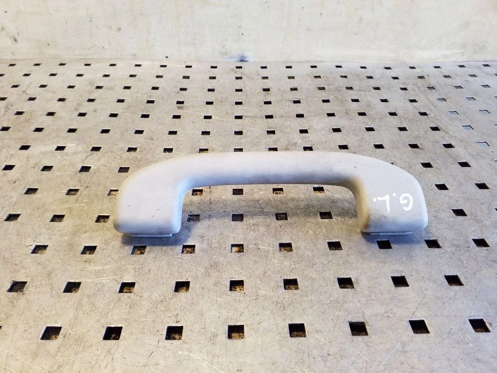 Rear interior roof grab handle – left