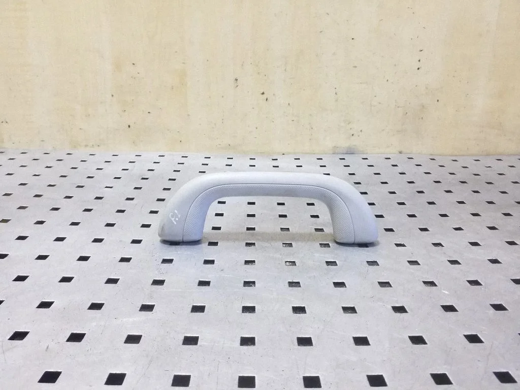 Front interior roof grab handle – left