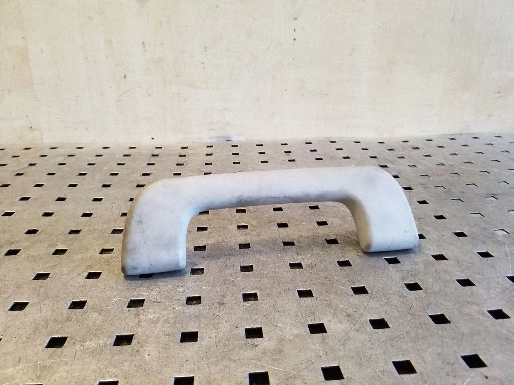 Front interior roof grab handle – left