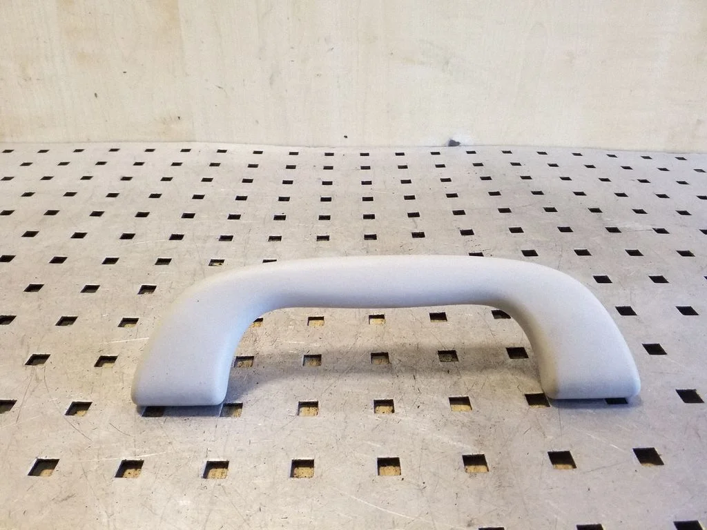 Front interior roof grab handle – left