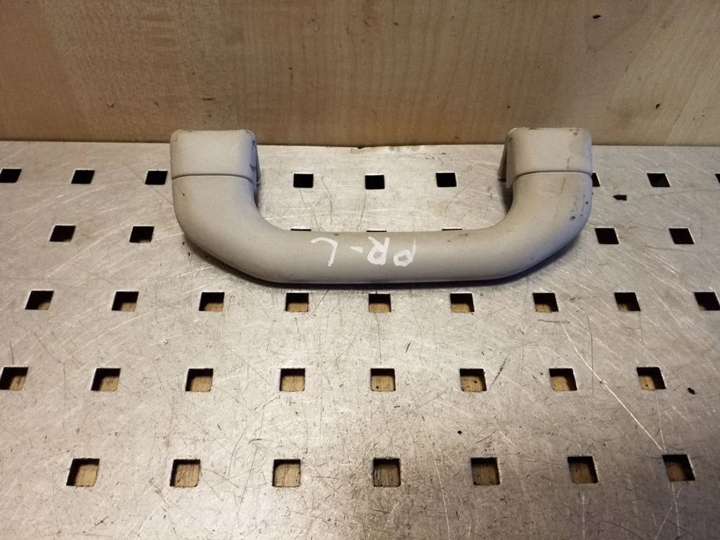 Front interior roof grab handle – left