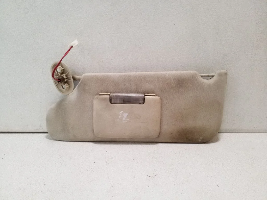 Sun visor – left