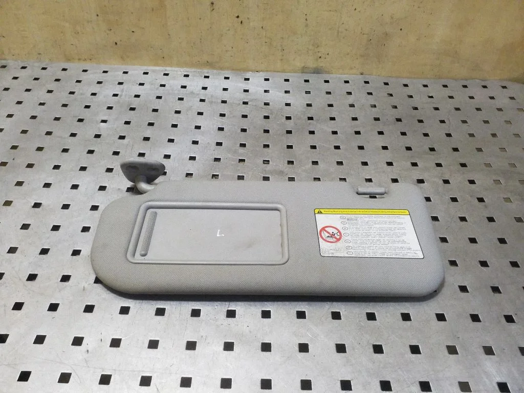 Sun visor – left