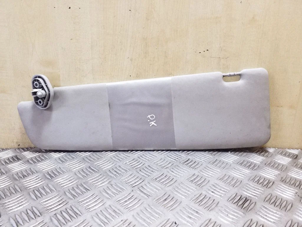 Sun visor – left