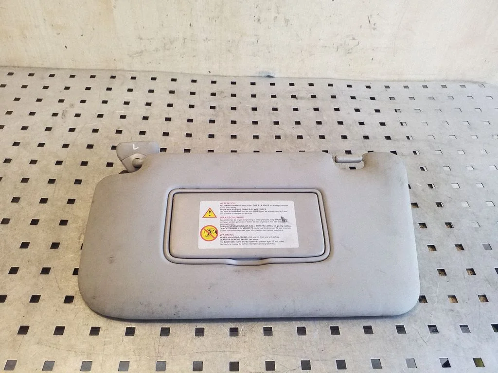 Sun visor – left