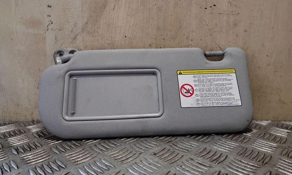 Sun visor – left