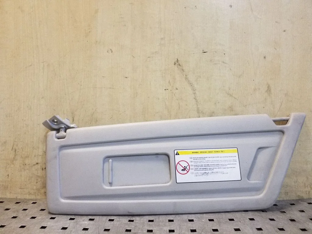 Sun visor – left