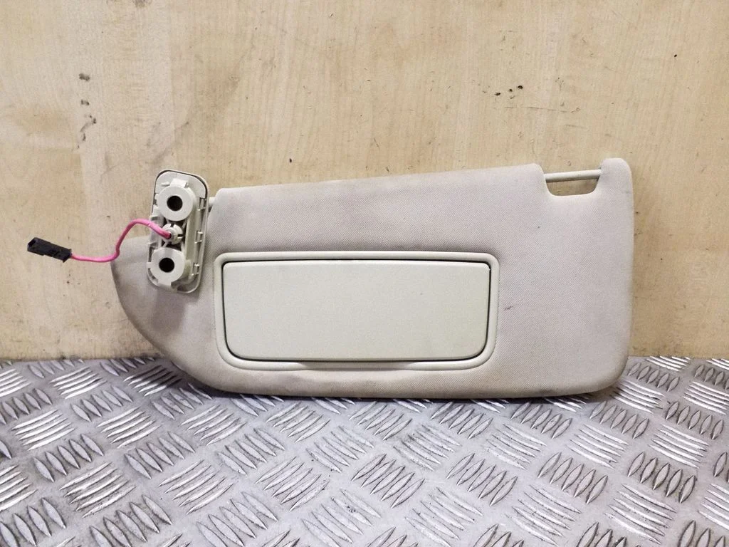 Sun visor – left