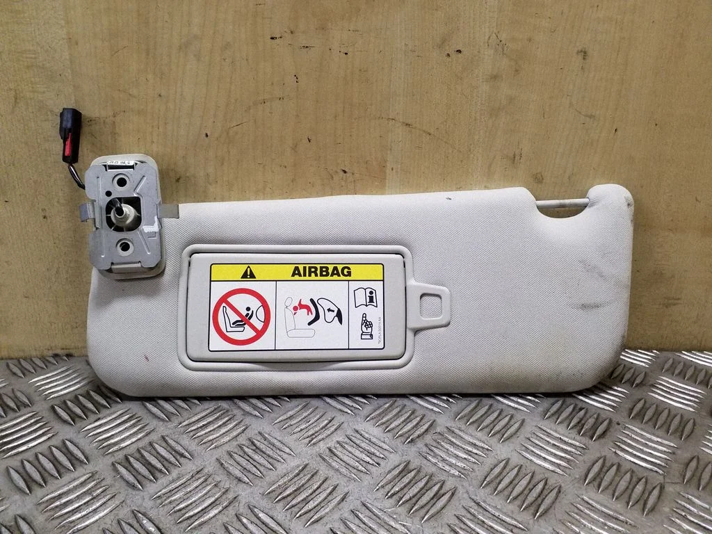 Sun visor – left