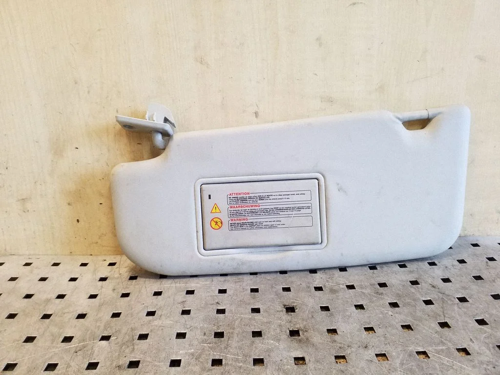 Sun visor – left