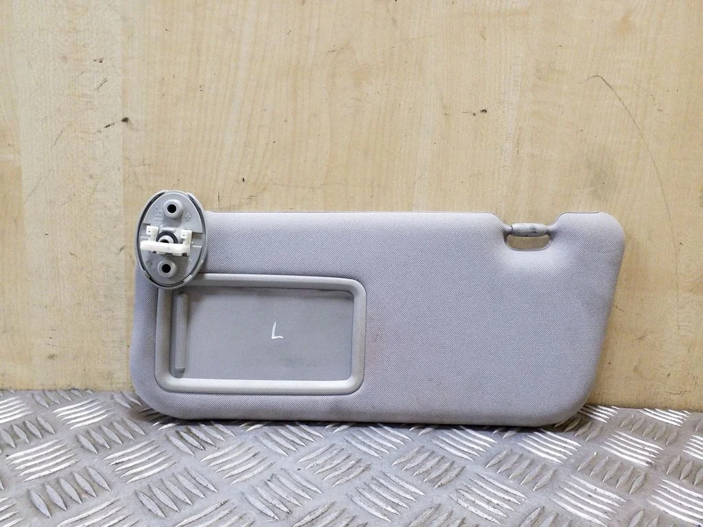 Sun visor – left