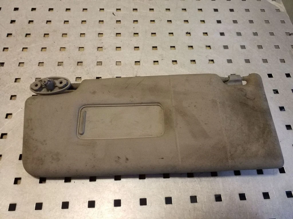 Sun visor – left