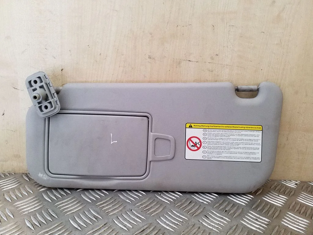 Sun visor – left