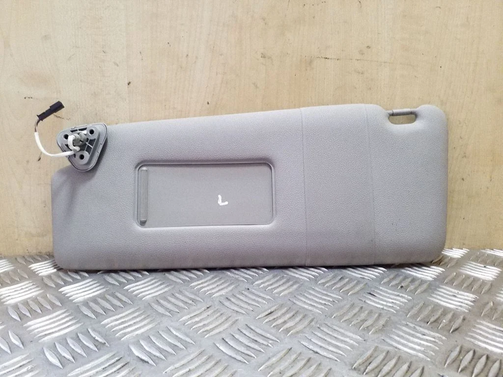 Sun visor – left