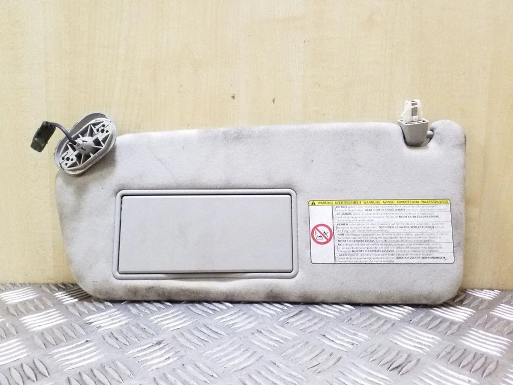 Sun visor – left