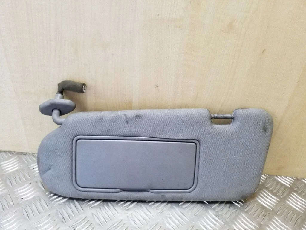 Sun visor – left