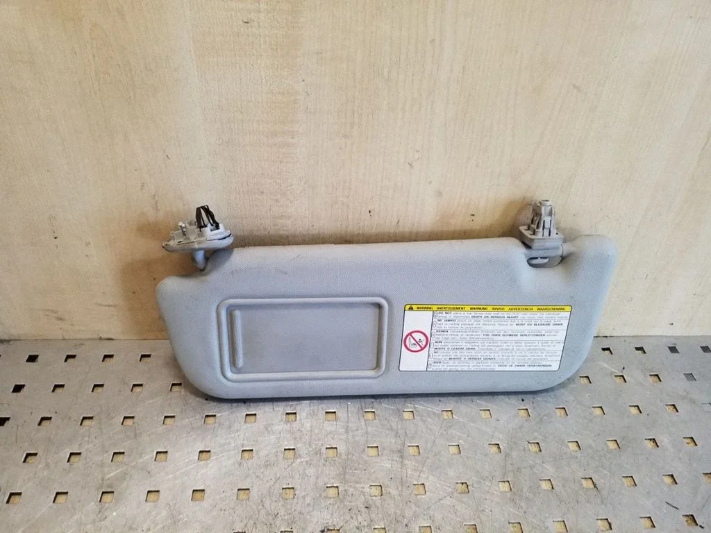 Sun visor – left