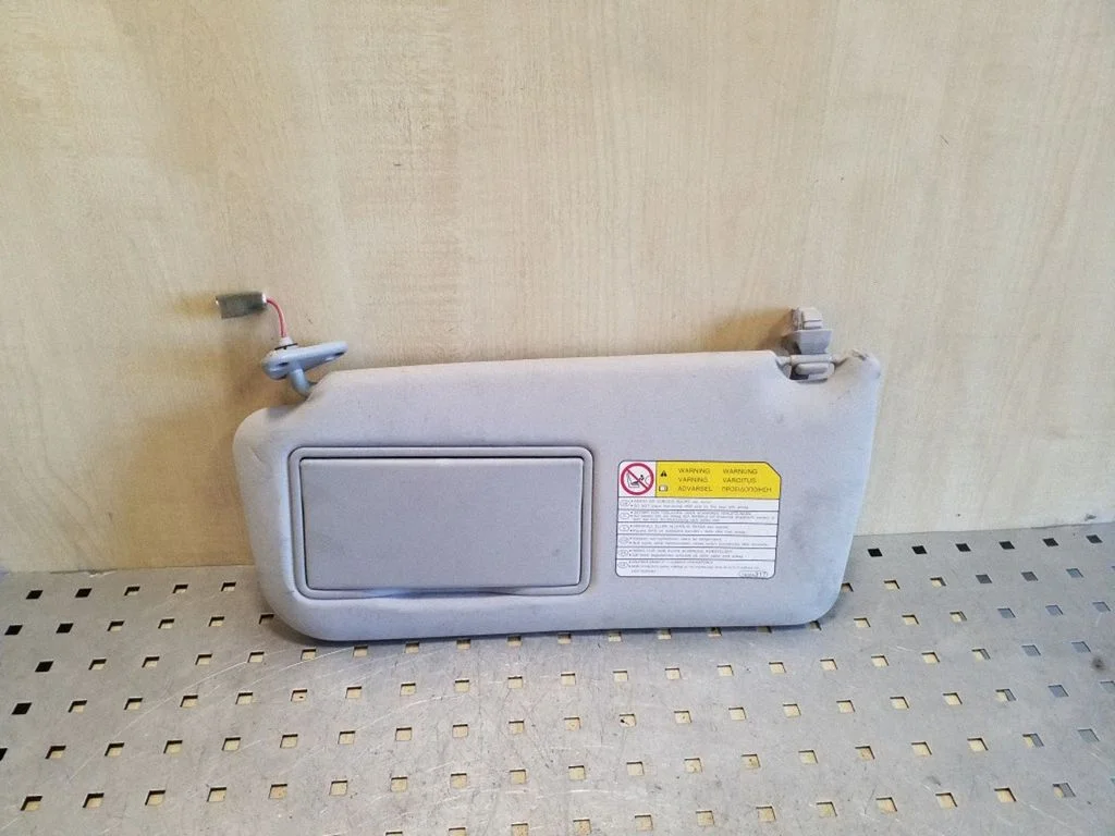 Sun visor – left
