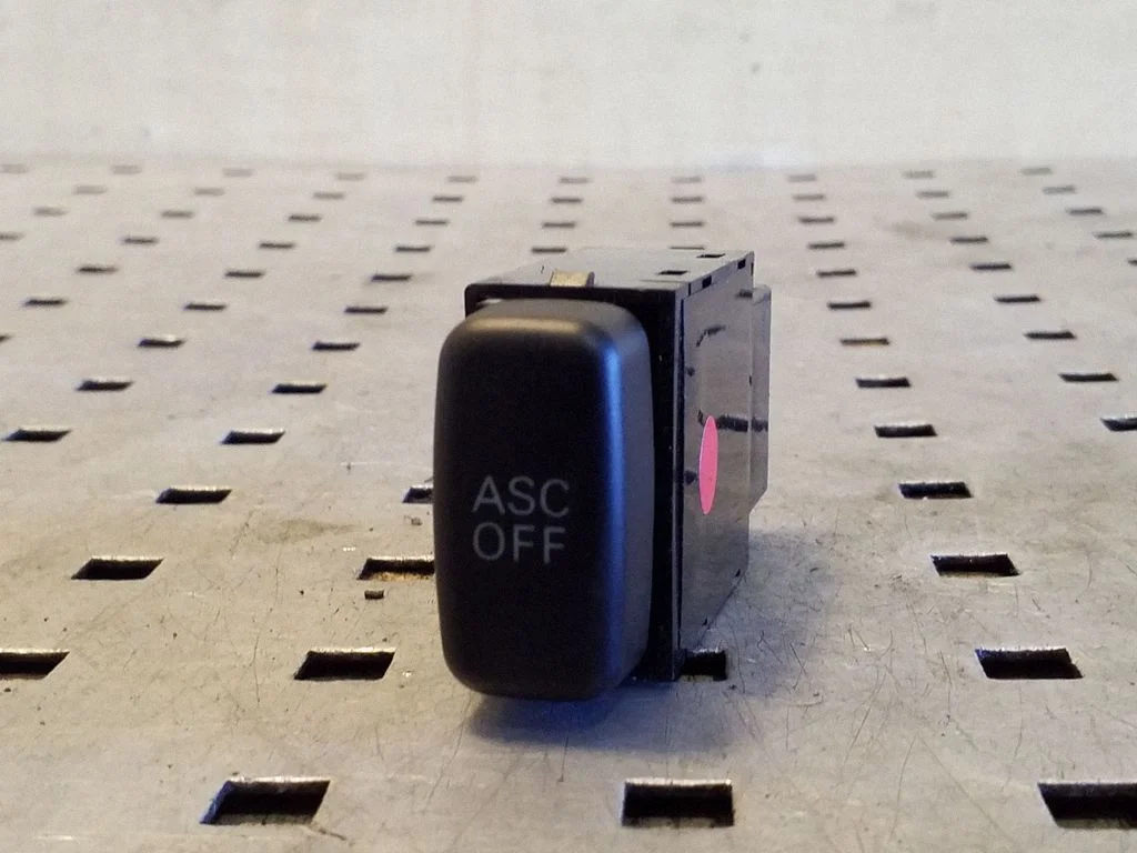 Traction control (ASR) switch – Mitsubishi Outlander (2001-2007)