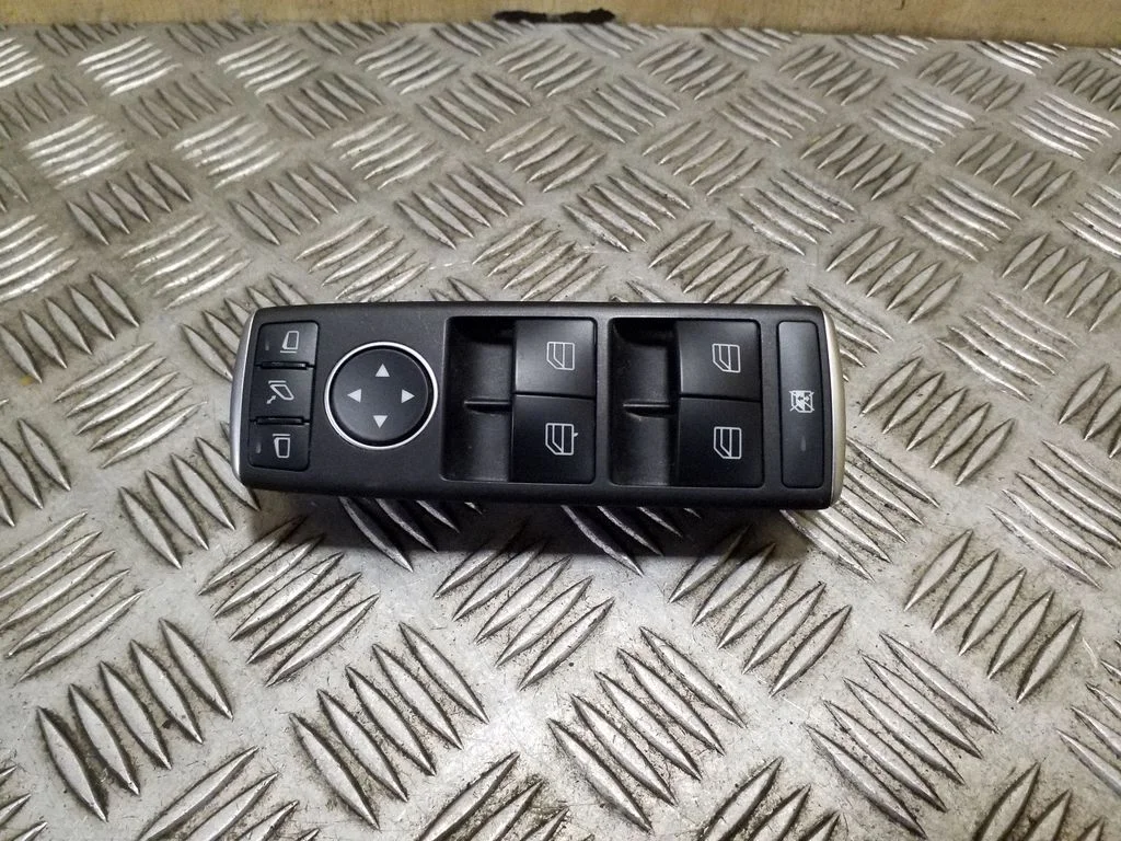 Electric window control switch – Tesla Model S (2012-)
