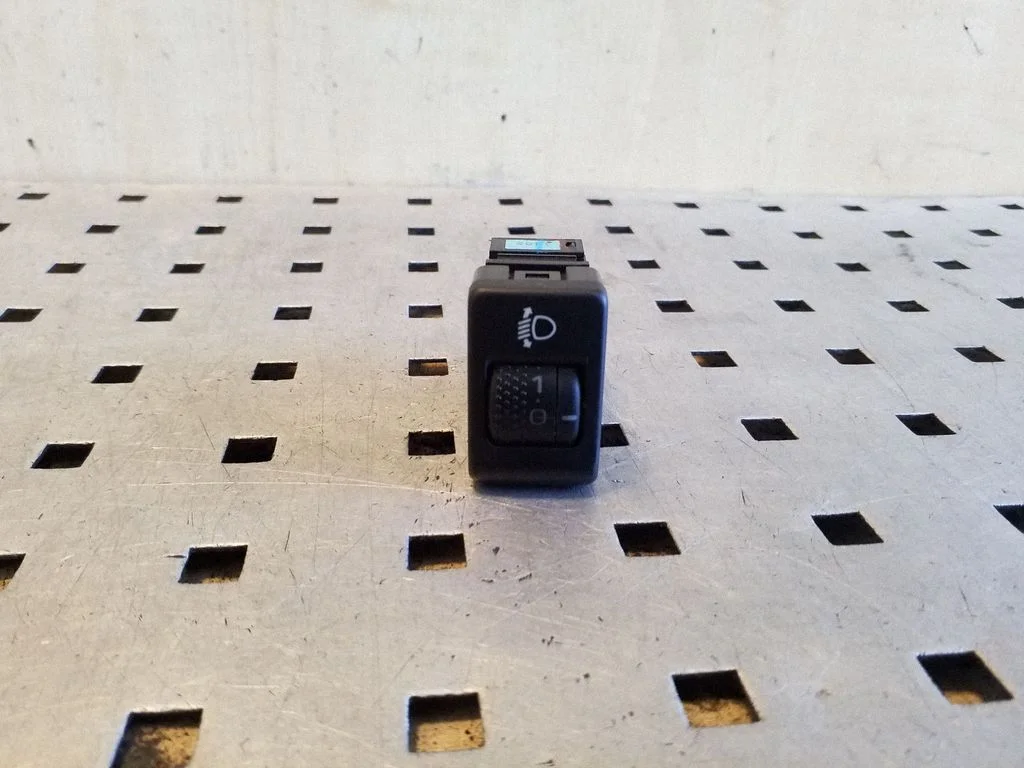 Headlight level height control switch