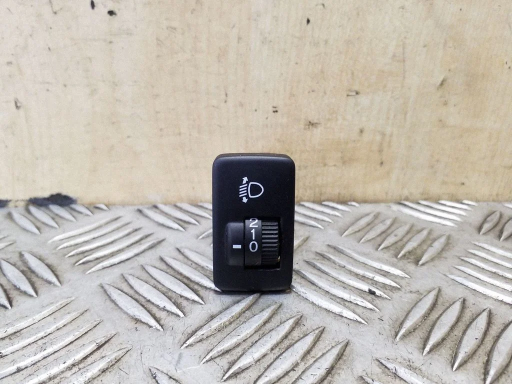 Headlight level height control switch