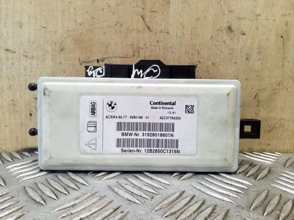 Drošības spilvenu vadības bloks 65779280186