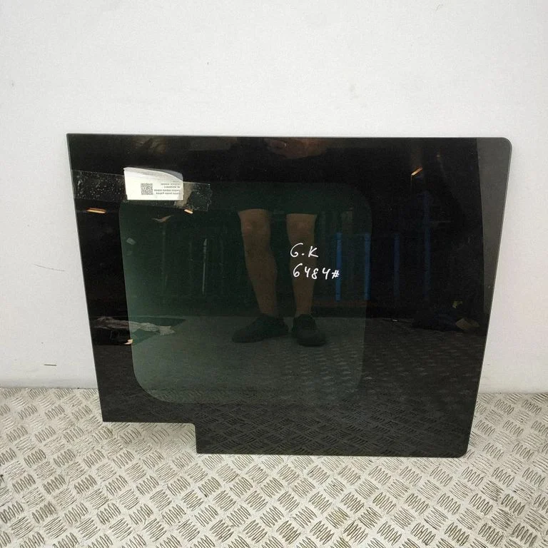 Rear side window – left