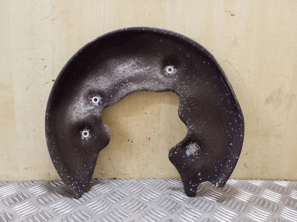 Rear brake disc plate dust cover – left